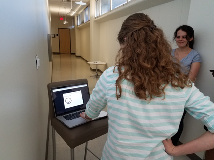 Participant viewing the welcome screen wireframe